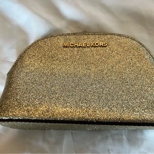 Michael Kors gold make up case